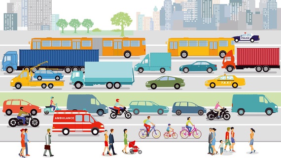 Zum Artikel Grafik einer Stadt mit Straßenverkehr und Fußgängern